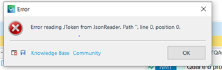 Error dialog box in Trados Studio with message: 'Error reading JToken from JsonReader. Path '', line 0, position 0.' with Knowledge Base and Community buttons at the bottom.