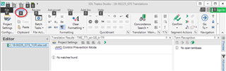 Trados Studio interface showing the Home tab with a red circle highlighting the 'Change Segment Status' keyboard shortcut ALT+H+U+T.