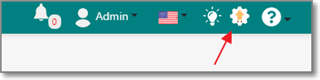 Screenshot of Trados Studio top right corner showing icons including a notification bell, Admin dropdown, language selection, settings gear, and a help question mark. A red arrow points to the update icon.