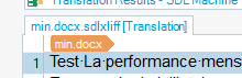 Screenshot of Trados Studio interface displaying a translation results pane with the file min.docx.sdlxliff and a segment of text 'Test: La performance-mens'.