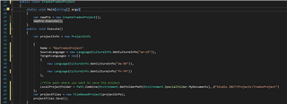 Photo of Trados Studio code with a method Main showing instantiation of CreateTradosProject and a call to Execute method, no errors displayed.