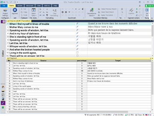 Trados Studio screenshot with segments sorted by target text in descending order, French to English translation.