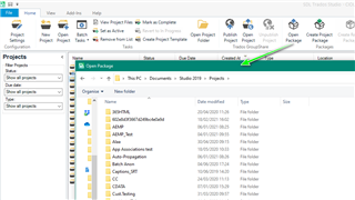 Trados Studio interface showing the 'Open Package' dialog with a list of folders and files in the Documents directory, with no visible errors or warnings.