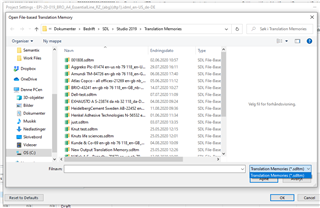 Screenshot of Trados Studio 2021 showing the Open File dialog with a list of TMX files, but the TMX file with the long name is not selected or visible for import.