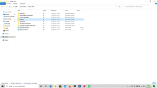 Screenshot of Trados Studio 2019 Projects folder showing a list of project files including 'Resume' with a green checkmark indicating successful transfer to the new laptop.