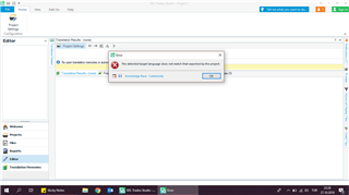 Trados Studio error message stating 'The selected target language does not match the project's.' with an 'OK' button.