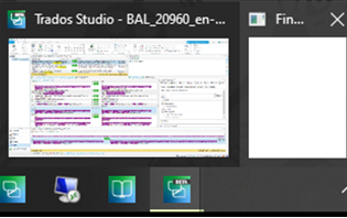 Trados Studio application with an empty white rectangle appearing from the bottom toolbar when hovering over the Studio icon, indicating the Find & Replace dialog is off-screen.