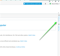 Screenshot of Trados Studio with a green arrow pointing to the 'Install' option in the Notification pane tab.