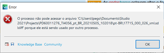 Error message in Trados Studio in Portuguese stating the file cannot be accessed because it's being used by another process.