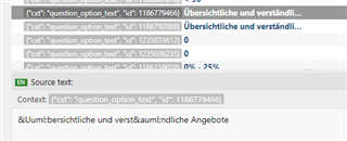 Screenshot of Trados Studio showing incorrect representation of umlauts in the source text, displaying 'Ü' instead of ' '.