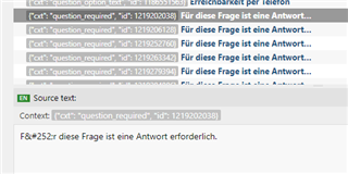Screenshot of Trados Studio with incorrect umlaut representation, showing 'F&252;r' instead of 'F r' in the source text.