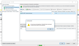 Trados Studio error message pop-up saying 'Not all translation units could be saved. Maybe some documents are open in another application.' with an OK button.