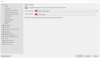 Trados Studio Options window with Default Languages settings, Source language set to English (United Kingdom) and Target language set to Turkish (Turkey).