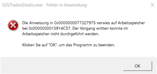 Error message in SDL Trados Studio indicating a memory reference issue with the instruction at 0x0000000077327975 and memory at 0x0000000015914C57, stating the 'written' operation could not be performed.