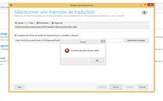 SDL Trados Studio 2019 error message in French stating 'Le chemin de sortie n'est pas valide!' with an OK button, indicating an invalid output path during Alignment project setup.