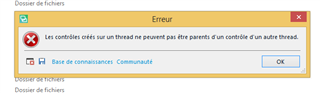 Error message in Trados Studio stating 'The controls on a thread cannot be accessed by a control on another thread.' with an OK button.