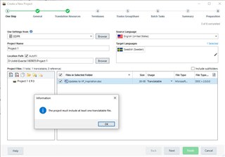 Trados Studio screenshot showing an error message 'The project must include at least one translatable file.' in the 'Create a New Project' window with 'One Step' tab selected.