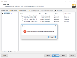 Trados Studio New Project window displaying an error message stating 'The project must include at least one translatable file.' with a list of files in the background.