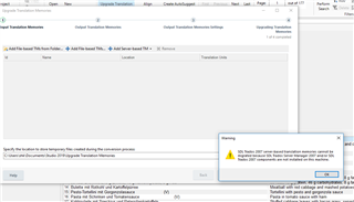 Screenshot of Trados Studio showing an error message '50003: TM could not be upgraded because it is not a valid TM archive file.' with an Upgrade Translation Memories window in the background.