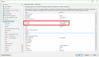 Trados Studio 2017 Keyboard Shortcuts options window showing En Dash and Em Dash shortcuts set to Ctrl+Subtract and Ctrl+Alt+Subtract respectively, highlighted in red.