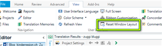 Trados Studio screenshot showing the 'Reset Windows Layout' option highlighted in the 'View' ribbon tab.