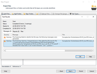 Trados Studio New Project window showing a warning message for a file with invalid characters at line 1, position 1.