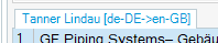 Trados Studio interface showing the translation memory 'Tanner Lindau (de-DE->en-GB)' selected with a project file 'GF Piping Systems - Gehai' listed below.