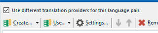 Trados Studio screenshot showing the option to use different translation providers for the German-English language pair with buttons for Create, Use, Settings, and Remove.