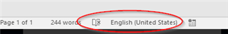 Trados Studio footer showing language selection marked 'English (United States)' with a red underline indicating a spelling check error.