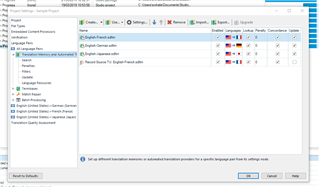 Trados Studio screenshot showing Project Settings window with Language Pairs, English (United States) - German (Germany), and a warning icon next to the file path for English source files.