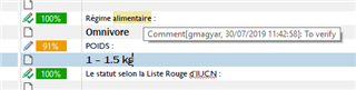 Trados Studio interface with a segment highlighted in light yellow indicating a comment has been added, with the comment visible on mouse hover.