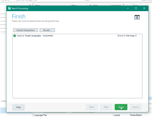 Finish window in Trados Studio displaying 'Copy to Target Languages' task as completed with no errors or warnings.