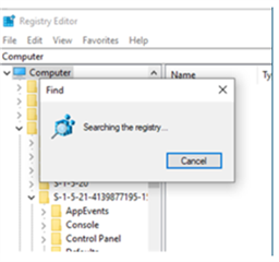 Registry Editor displaying a progress window indicating 'Searching the registry...' with a cancel button.