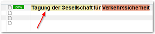 Screenshot of Trados Studio interface showing a segment of text 'Tagung der Gesellschaft fur Verkehrssicherheit' highlighted in yellow with a red arrow pointing to it.
