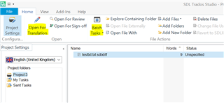 Trados Studio interface displaying an open project with 'Open For Translation' button highlighted and a file named 'test.sdlxliff' with 'Words' and 'Status' columns showing 'Unspecified'.