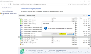 Uninstall or change a program dialog with 'Trados Studio 2019' selected and 'Repair' option highlighted in a confirmation prompt.