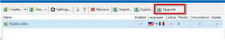 Close-up of Trados Studio Translation Memory and Automated Translation tab with an orange triangle warning next to a TM name indicating it needs an upgrade.