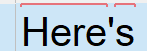 Close-up of Trados Studio interface showing the term 'Here's' with a red squiggly line indicating a potential error.