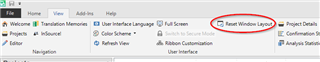 Trados Studio screenshot showing the 'Reset Window Layout' option circled in red under the 'View' tab.