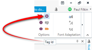 Trados Studio screenshot showing the Tag Id option highlighted in the editor toolbar.