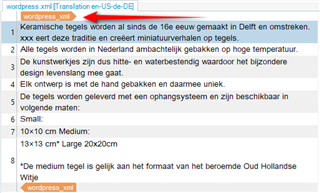 Trados Studio editor displaying 'wordpress.xml Translation en-US>de-DE' at the top with Dutch text content below.