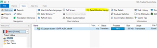 Trados Studio main interface with a project open, showing the 'Reset Window Layout' option highlighted in the View tab.