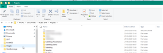 Trados Studio project folder window showing various project files such as 'Marketing Presentation' and 'Marketing Demo' with no visible errors.