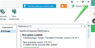 Trados Studio notification alert indicating a new update available for 'AppStoreIntegrationNotifications' and a restart required after update.