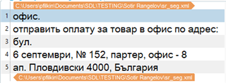 Screenshot of an XML file opened in Trados Studio with segmented text. The text includes an address with line breaks between segments.
