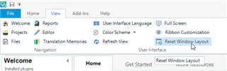 Trados Studio screenshot showing the 'Reset Window Layout' option highlighted in the 'View' tab.
