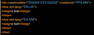 Screenshot of Trados Studio showing XML code with language codes EN-US and ES-EM for a translation unit test.