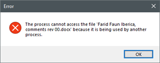 Error message in Trados Studio stating 'The process cannot access the file 'Farid Faun Iberica, comments rev 00.docx' because it is being used by another process.' with an OK button.