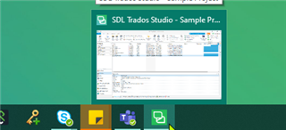 Trados Studio application minimized in the taskbar with the icon glowing, indicating it's running but not visible on the screen.