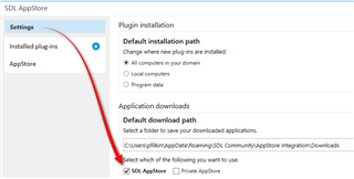 Trados Studio settings with a red arrow pointing to the default download path for applications.